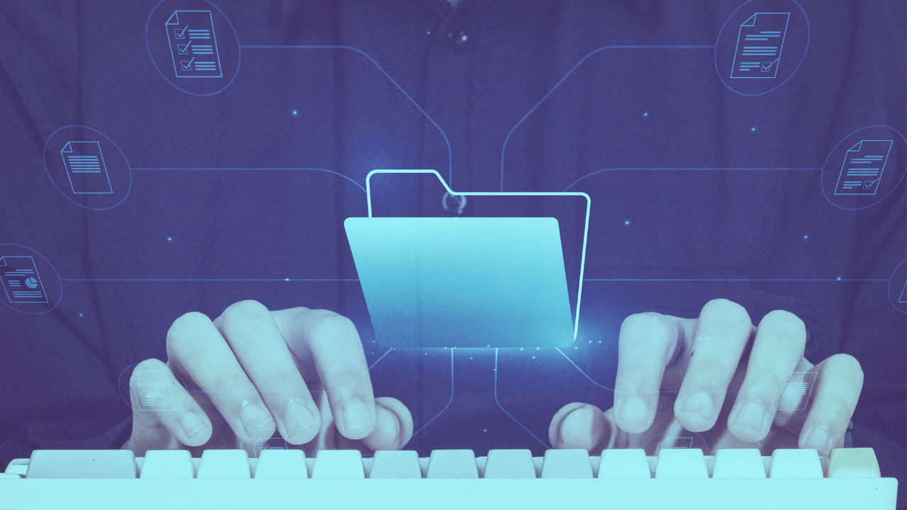 Person typing on a keyboard with icon of file and documents above hands.